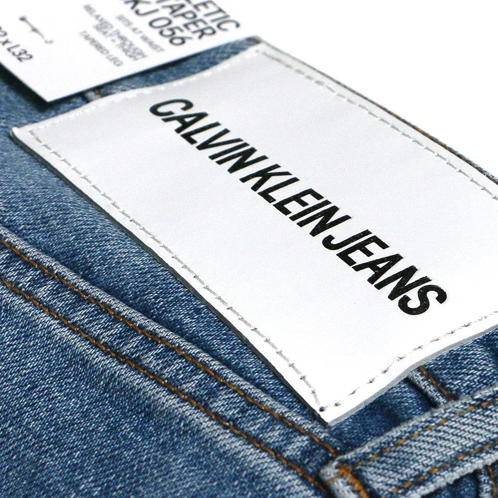 Athletic Taper Patchwork Denim - CALVIN KLEIN - VENTURER
