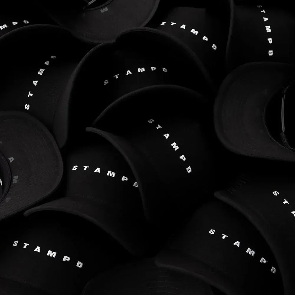 Strike Logo Trucker Hat - STAMPD - VENTURER