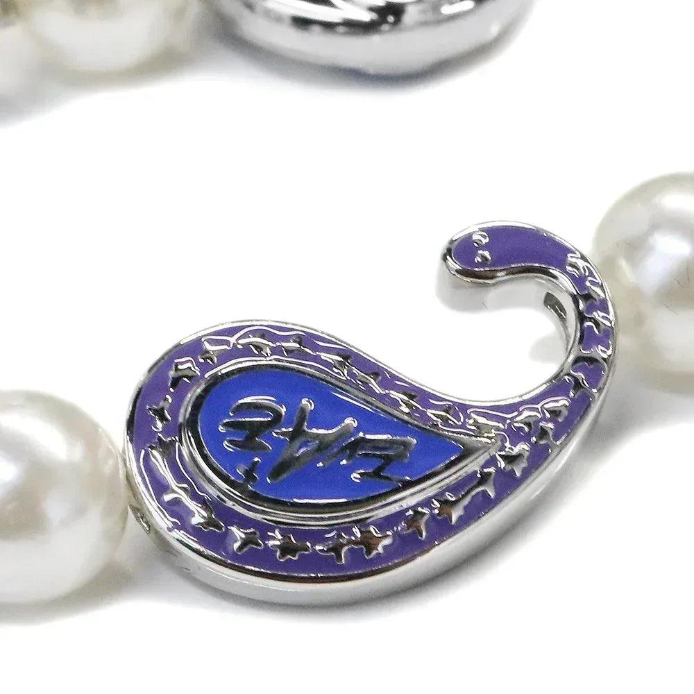 EVAE+MOB(エバーモブ)商品ページ - EVAE Cross Flower Smiley Necklace