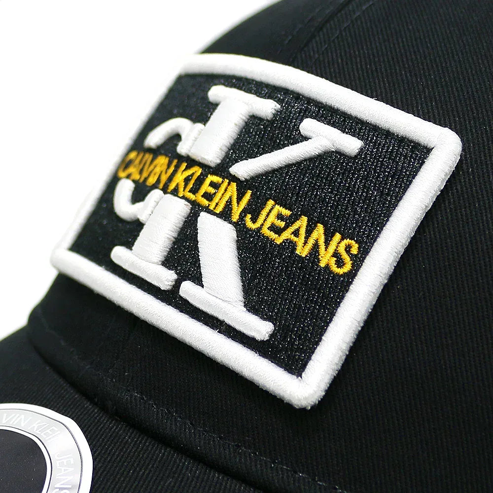 Monogram Logo Patch Trucker Cap - CALVIN KLEIN - VENTURER
